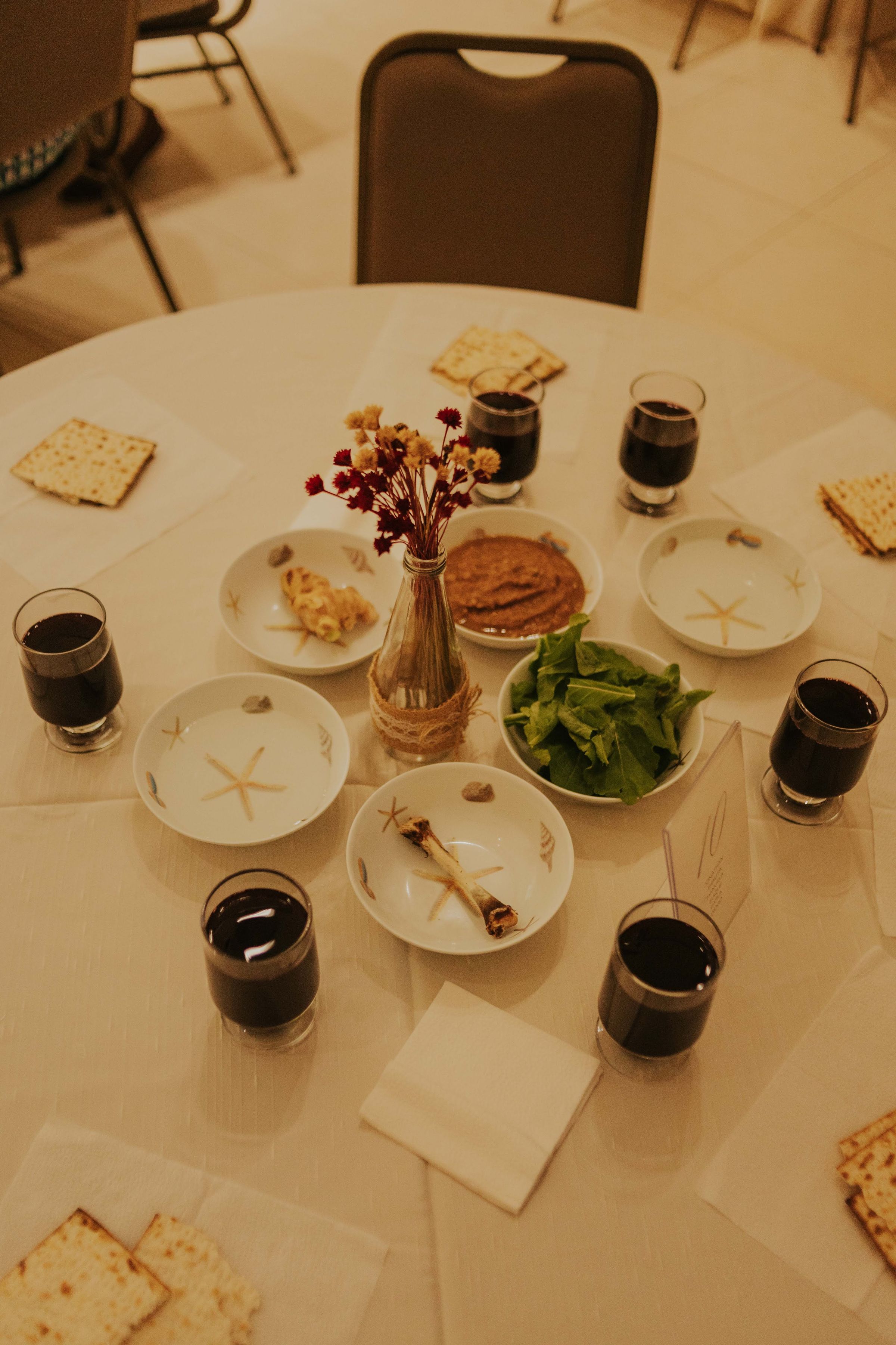 Passover Seder table with matzah and wine, illustrating the Last Supper setting