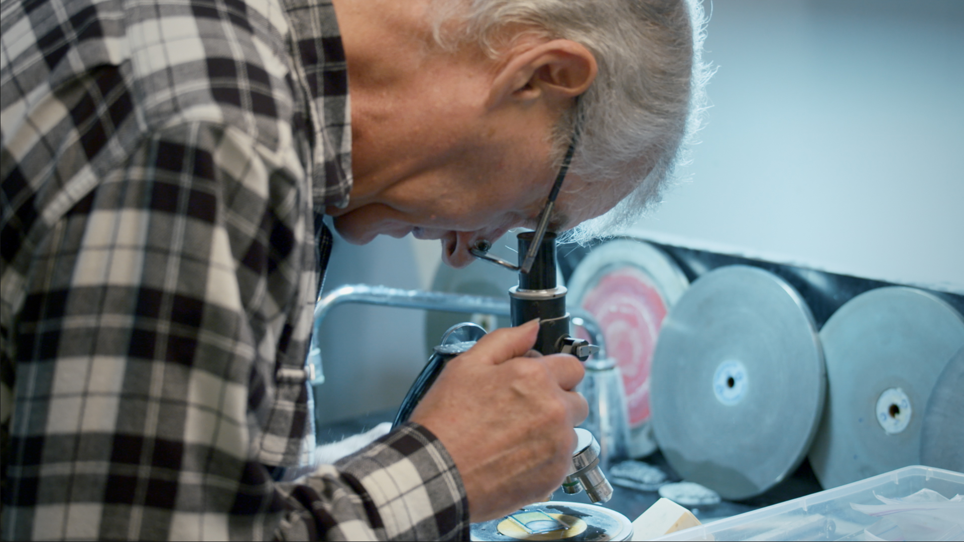 Ray Strom Looking Through Microscope